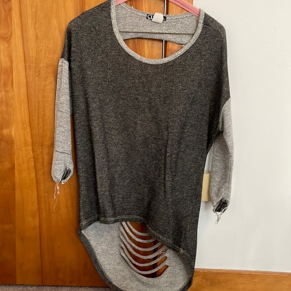 Woman’s High to Low Distressed Top